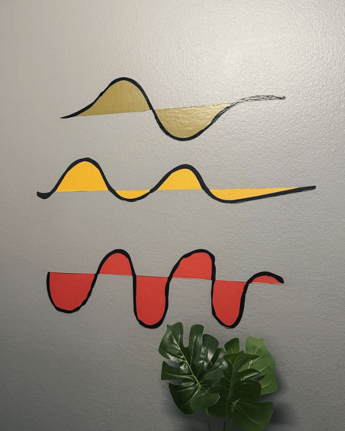 Vibrato Espaço de Música Porto Alegre – painel com ondas sonoras da identidade visual.